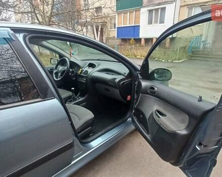 Серый Пежо 206, объемом двигателя 1.36 л и пробегом 234 тыс. км за 3000 $, фото 15 на Automoto.ua