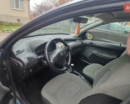 Серый Пежо 206, объемом двигателя 1.36 л и пробегом 234 тыс. км за 3000 $, фото 9 на Automoto.ua