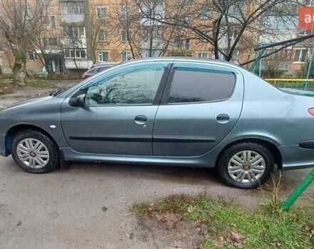 Серый Пежо 206, объемом двигателя 1.36 л и пробегом 234 тыс. км за 3000 $, фото 1 на Automoto.ua
