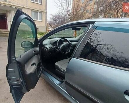 Серый Пежо 206, объемом двигателя 1.36 л и пробегом 234 тыс. км за 3000 $, фото 6 на Automoto.ua