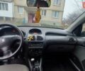 Серый Пежо 206, объемом двигателя 1.36 л и пробегом 234 тыс. км за 3000 $, фото 4 на Automoto.ua
