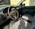Серый Пежо 206, объемом двигателя 1.36 л и пробегом 49 тыс. км за 4700 $, фото 6 на Automoto.ua