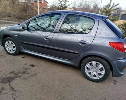 Сірий Пежо 206, об'ємом двигуна 1.4 л та пробігом 185 тис. км за 3900 $, фото 3 на Automoto.ua
