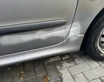 Серый Пежо 206, объемом двигателя 1.4 л и пробегом 202 тыс. км за 2499 $, фото 2 на Automoto.ua