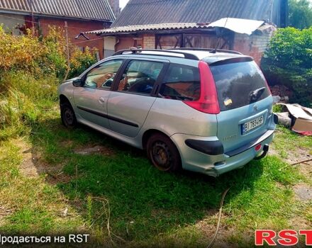 Серый Пежо 206, объемом двигателя 1.4 л и пробегом 167 тыс. км за 1800 $, фото 1 на Automoto.ua