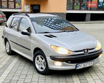 Серый Пежо 206, объемом двигателя 1.4 л и пробегом 260 тыс. км за 2850 $, фото 4 на Automoto.ua