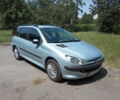 Серый Пежо 206, объемом двигателя 1.4 л и пробегом 100 тыс. км за 4600 $, фото 1 на Automoto.ua