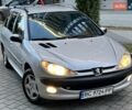 Серый Пежо 206, объемом двигателя 1.4 л и пробегом 319 тыс. км за 3100 $, фото 1 на Automoto.ua