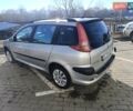 Сірий Пежо 206, об'ємом двигуна 1.36 л та пробігом 264 тис. км за 3400 $, фото 9 на Automoto.ua