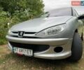 Серый Пежо 206, объемом двигателя 1.4 л и пробегом 314 тыс. км за 1449 $, фото 1 на Automoto.ua