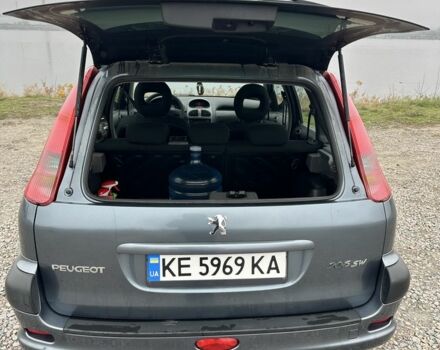 Серый Пежо 206, объемом двигателя 1.4 л и пробегом 209 тыс. км за 3700 $, фото 2 на Automoto.ua