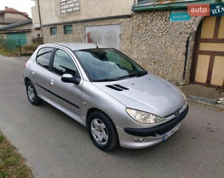 Серый Пежо 206, объемом двигателя 1.39 л и пробегом 289 тыс. км за 2750 $, фото 1 на Automoto.ua