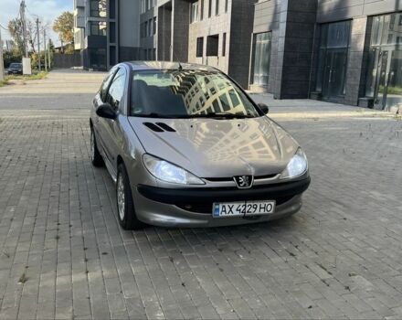 Серый Пежо 206, объемом двигателя 1.1 л и пробегом 200 тыс. км за 1255 $, фото 1 на Automoto.ua