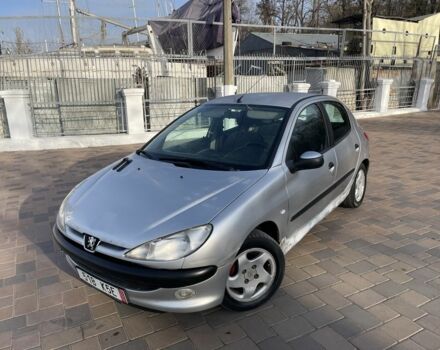 Серый Пежо 206, объемом двигателя 1.9 л и пробегом 200 тыс. км за 1299 $, фото 1 на Automoto.ua