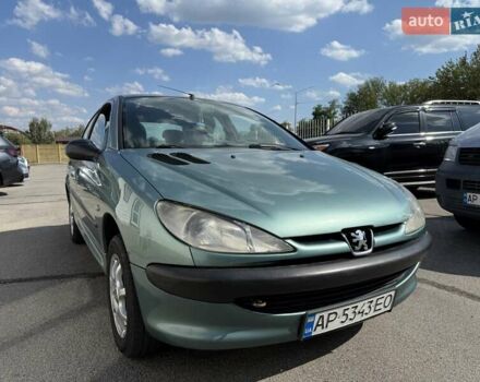 Серый Пежо 206, объемом двигателя 1.36 л и пробегом 197 тыс. км за 2999 $, фото 1 на Automoto.ua