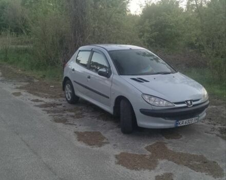 Серый Пежо 206, объемом двигателя 1.4 л и пробегом 250 тыс. км за 2250 $, фото 1 на Automoto.ua