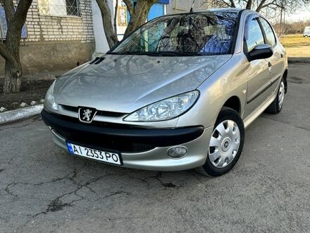 Серый Пежо 206, объемом двигателя 1.4 л и пробегом 165 тыс. км за 3750 $, фото 1 на Automoto.ua