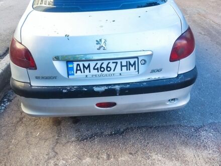 Серый Пежо 206, объемом двигателя 1.4 л и пробегом 343 тыс. км за 1800 $, фото 1 на Automoto.ua