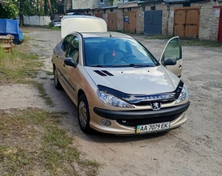 Серый Пежо 206, объемом двигателя 1.4 л и пробегом 57 тыс. км за 4200 $, фото 1 на Automoto.ua