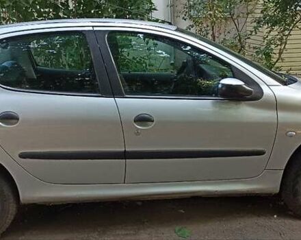 Сірий Пежо 206, об'ємом двигуна 1.59 л та пробігом 144 тис. км за 4400 $, фото 1 на Automoto.ua