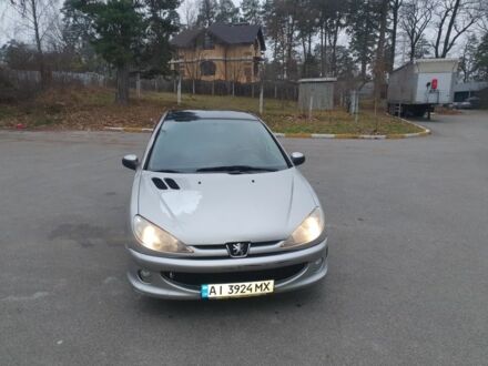 Серый Пежо 206, объемом двигателя 1.4 л и пробегом 260 тыс. км за 3000 $, фото 1 на Automoto.ua
