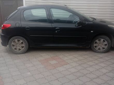 Серый Пежо 206, объемом двигателя 1.1 л и пробегом 124 тыс. км за 4300 $, фото 1 на Automoto.ua