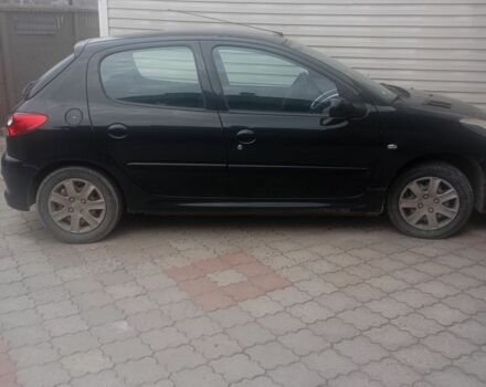 Серый Пежо 206, объемом двигателя 1.1 л и пробегом 124 тыс. км за 4300 $, фото 1 на Automoto.ua