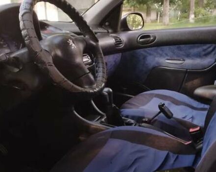 Синій Пежо 206, об'ємом двигуна 1.1 л та пробігом 250 тис. км за 1150 $, фото 5 на Automoto.ua