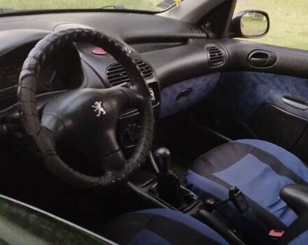 Синій Пежо 206, об'ємом двигуна 1.1 л та пробігом 250 тис. км за 1150 $, фото 6 на Automoto.ua