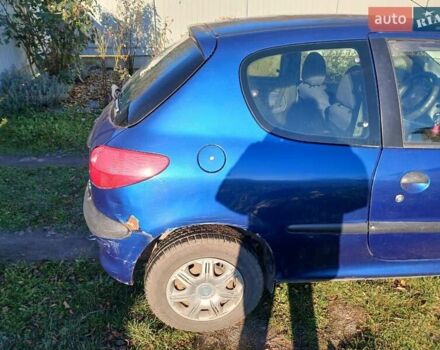Синий Пежо 206, объемом двигателя 1.1 л и пробегом 141 тыс. км за 1700 $, фото 18 на Automoto.ua