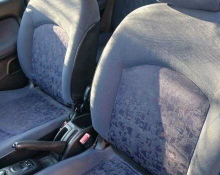 Синий Пежо 206, объемом двигателя 1.1 л и пробегом 141 тыс. км за 1700 $, фото 13 на Automoto.ua