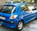 Синій Пежо 206, об'ємом двигуна 1.4 л та пробігом 240 тис. км за 3000 $, фото 3 на Automoto.ua