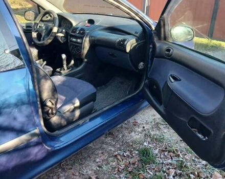 Синий Пежо 206, объемом двигателя 1.1 л и пробегом 141 тыс. км за 1700 $, фото 22 на Automoto.ua