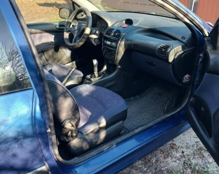 Синий Пежо 206, объемом двигателя 1.1 л и пробегом 141 тыс. км за 1700 $, фото 16 на Automoto.ua