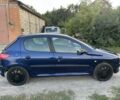 Синій Пежо 206, об'ємом двигуна 1.4 л та пробігом 200 тис. км за 1050 $, фото 5 на Automoto.ua