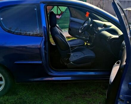 Синий Пежо 206, объемом двигателя 1.1 л и пробегом 315 тыс. км за 2200 $, фото 8 на Automoto.ua