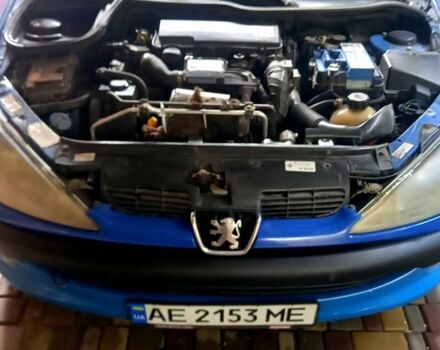 Синий Пежо 206, объемом двигателя 1.4 л и пробегом 295 тыс. км за 2100 $, фото 6 на Automoto.ua