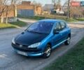 Синий Пежо 206, объемом двигателя 1.36 л и пробегом 270 тыс. км за 1990 $, фото 1 на Automoto.ua
