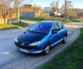 Синий Пежо 206, объемом двигателя 1.4 л и пробегом 270 тыс. км за 1990 $, фото 1 на Automoto.ua