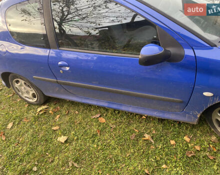 Синий Пежо 206, объемом двигателя 1.1 л и пробегом 250 тыс. км за 2100 $, фото 10 на Automoto.ua