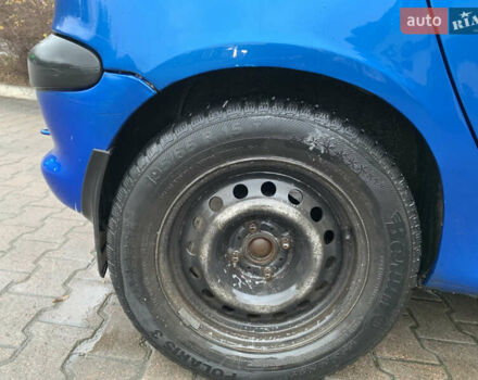 Синий Пежо 206, объемом двигателя 1.1 л и пробегом 261 тыс. км за 2400 $, фото 3 на Automoto.ua