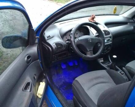 Синий Пежо 206, объемом двигателя 1.1 л и пробегом 257 тыс. км за 2400 $, фото 3 на Automoto.ua