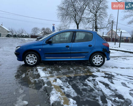 Синий Пежо 206, объемом двигателя 1.4 л и пробегом 242 тыс. км за 1999 $, фото 2 на Automoto.ua