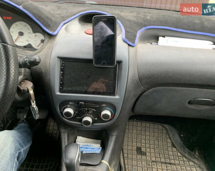 Синий Пежо 206, объемом двигателя 1.1 л и пробегом 261 тыс. км за 2400 $, фото 9 на Automoto.ua