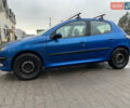Синий Пежо 206, объемом двигателя 1.1 л и пробегом 261 тыс. км за 2400 $, фото 5 на Automoto.ua