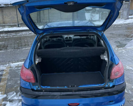 Синий Пежо 206, объемом двигателя 1.4 л и пробегом 242 тыс. км за 1999 $, фото 5 на Automoto.ua