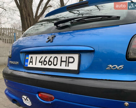 Синий Пежо 206, объемом двигателя 1.1 л и пробегом 261 тыс. км за 2400 $, фото 7 на Automoto.ua