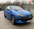 Синий Пежо 206, объемом двигателя 1.1 л и пробегом 261 тыс. км за 2400 $, фото 1 на Automoto.ua