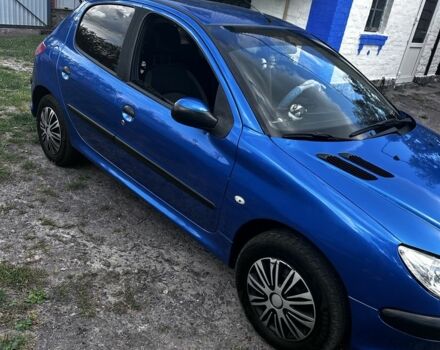 Синий Пежо 206, объемом двигателя 1.4 л и пробегом 151 тыс. км за 6400 $, фото 1 на Automoto.ua