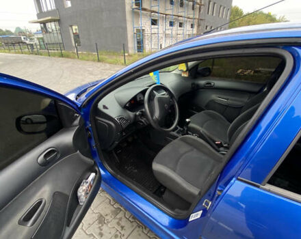 Синий Пежо 206, объемом двигателя 1.36 л и пробегом 197 тыс. км за 3800 $, фото 9 на Automoto.ua